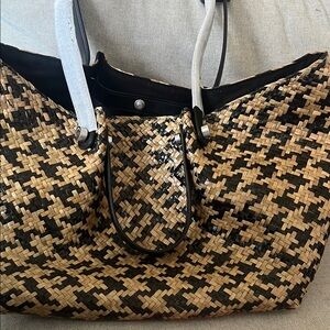 Woven All Saints Straw Tote Bag in Black and Natural.